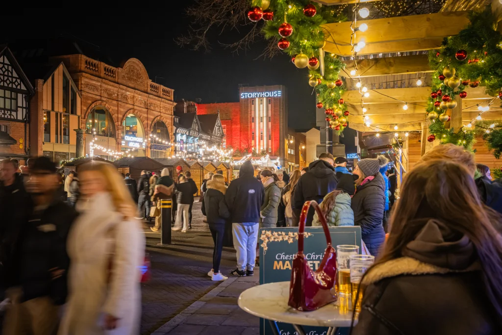 Chester Christmas Markets with twinkly lights and storyhouse in the background