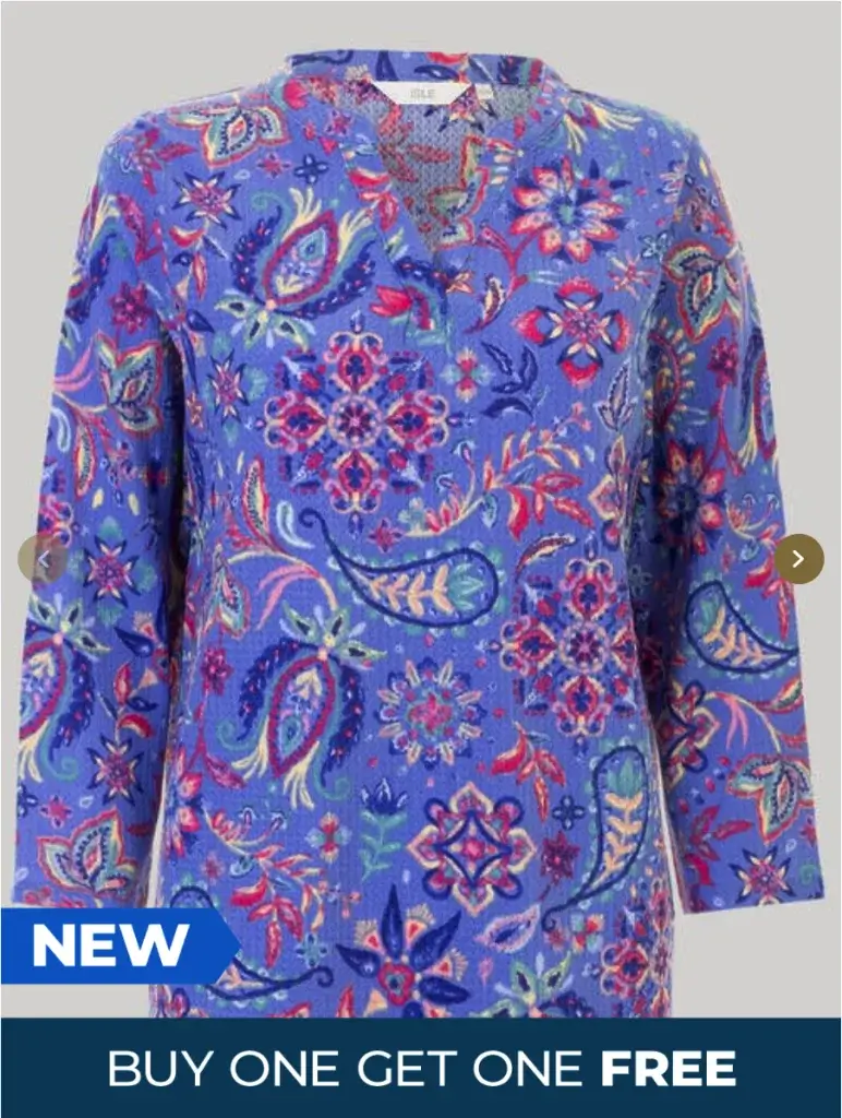 Bright blue blouse with a colorful floral and paisley pattern, featuring long sleeves and a v-neckline, promoting a buy one get one free offer.